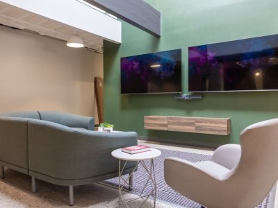 Renovia Sitting Area with Double TVs