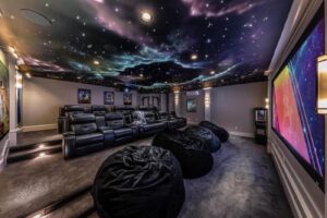 Luxury Home theater with high end audio and visual with a Starlight ceiling
