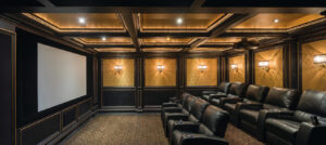 Luxury Home theater with high end lighting, audio and visual with a big screen